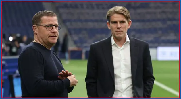 Max Eberl rubs his hands next to Christoph Freund.