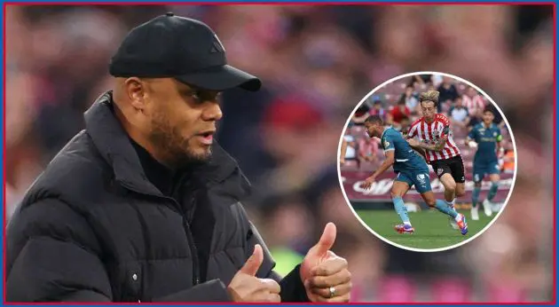 Vincent Kompany gives a double thumbs-up to Luis Henrique.