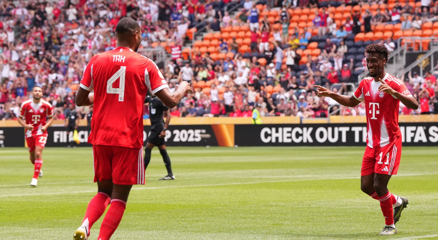 Kingsley Coman celebrates his first goal with Jonathan Tah