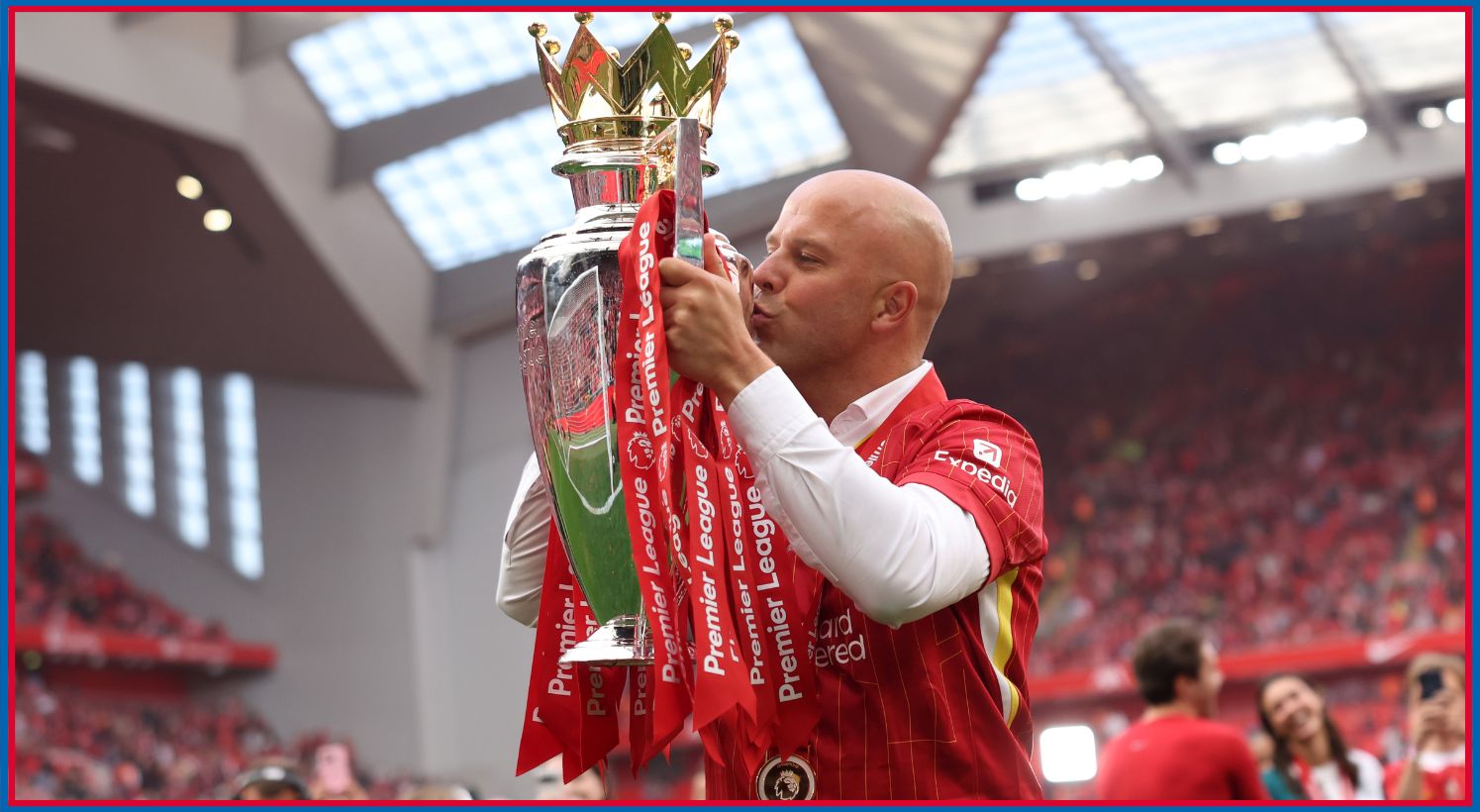 Arne Slot kisses the Premier League trophy