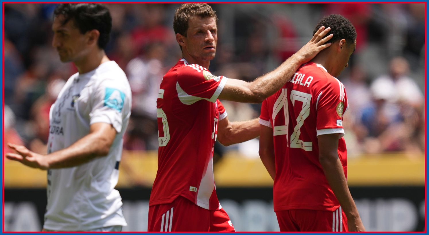 Jamal Musiala congratulated by Thomas Muller