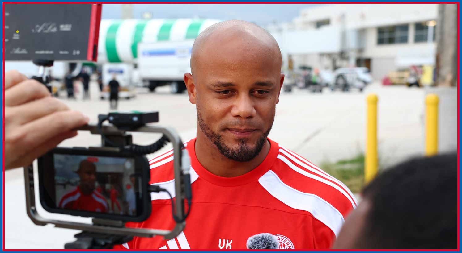 Vincent Kompany speaking to reporters
