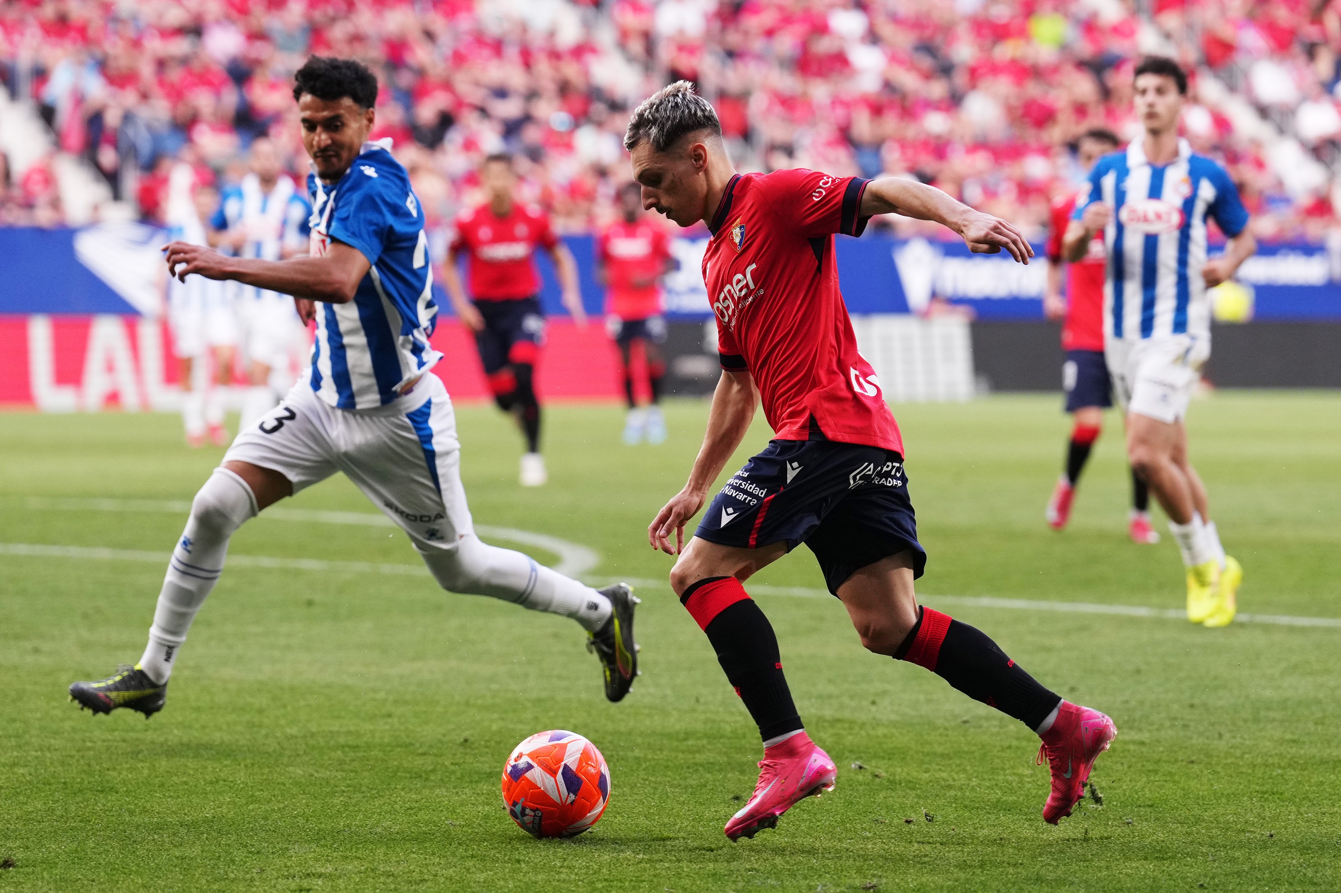 Bryan Zaragoza dribbles with the ball.