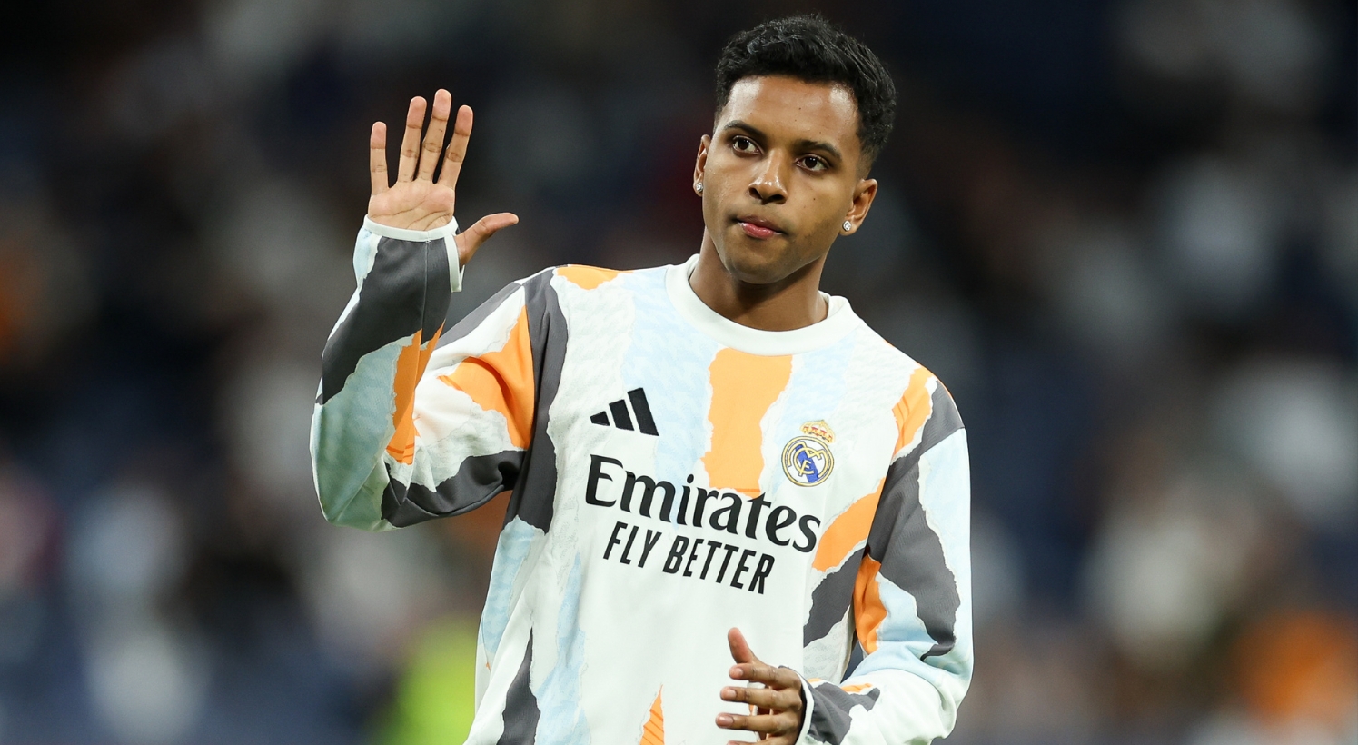 Rodrygo waves towards a fan
