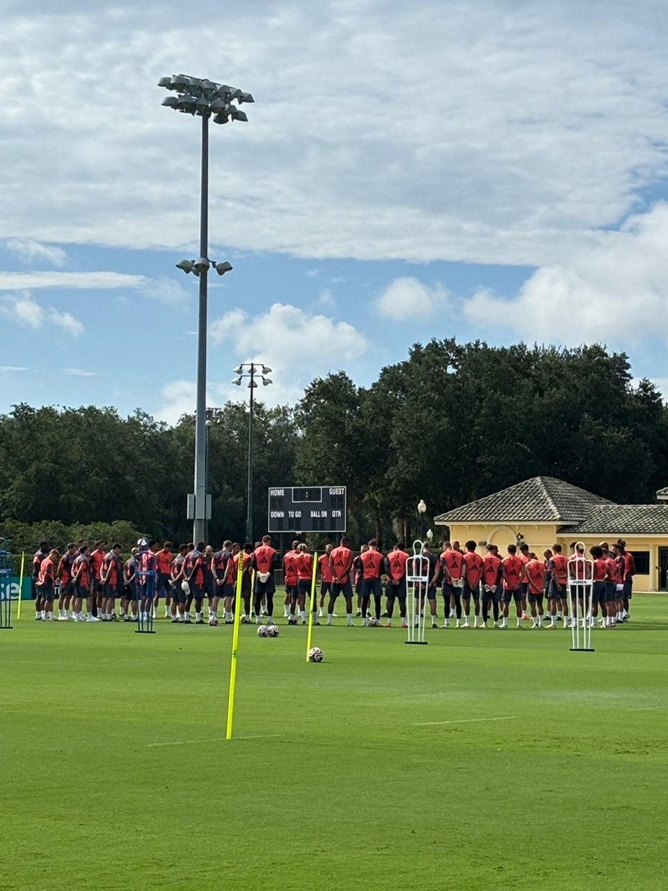 Bayern players gather in a circle on the training pitch in Orlando.