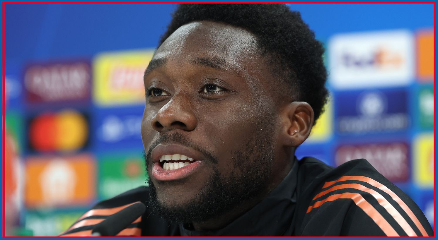 Alphonso Davies speaks to the reporters