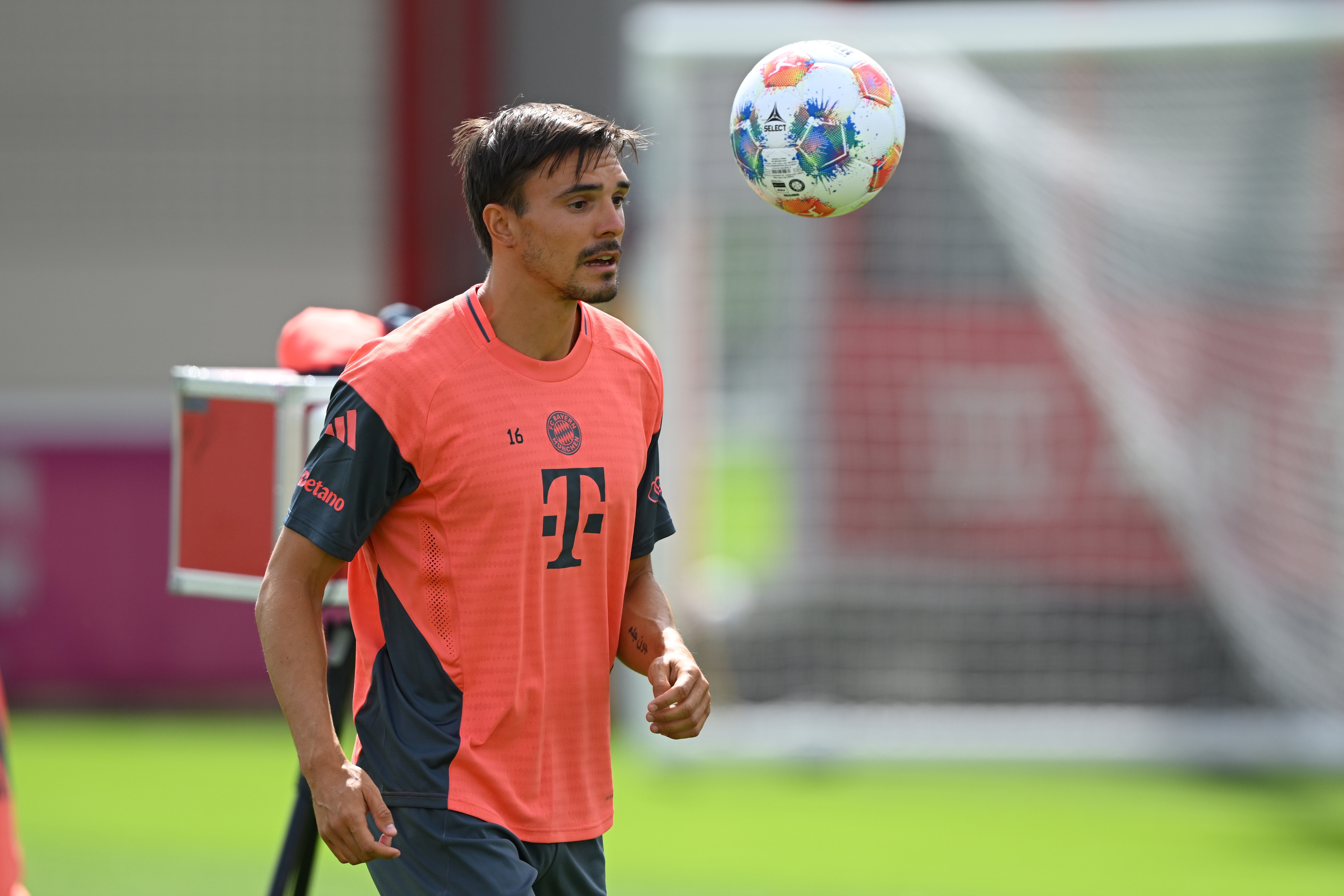 Joao Palhinha heads a ball during Bayern Munich training.
