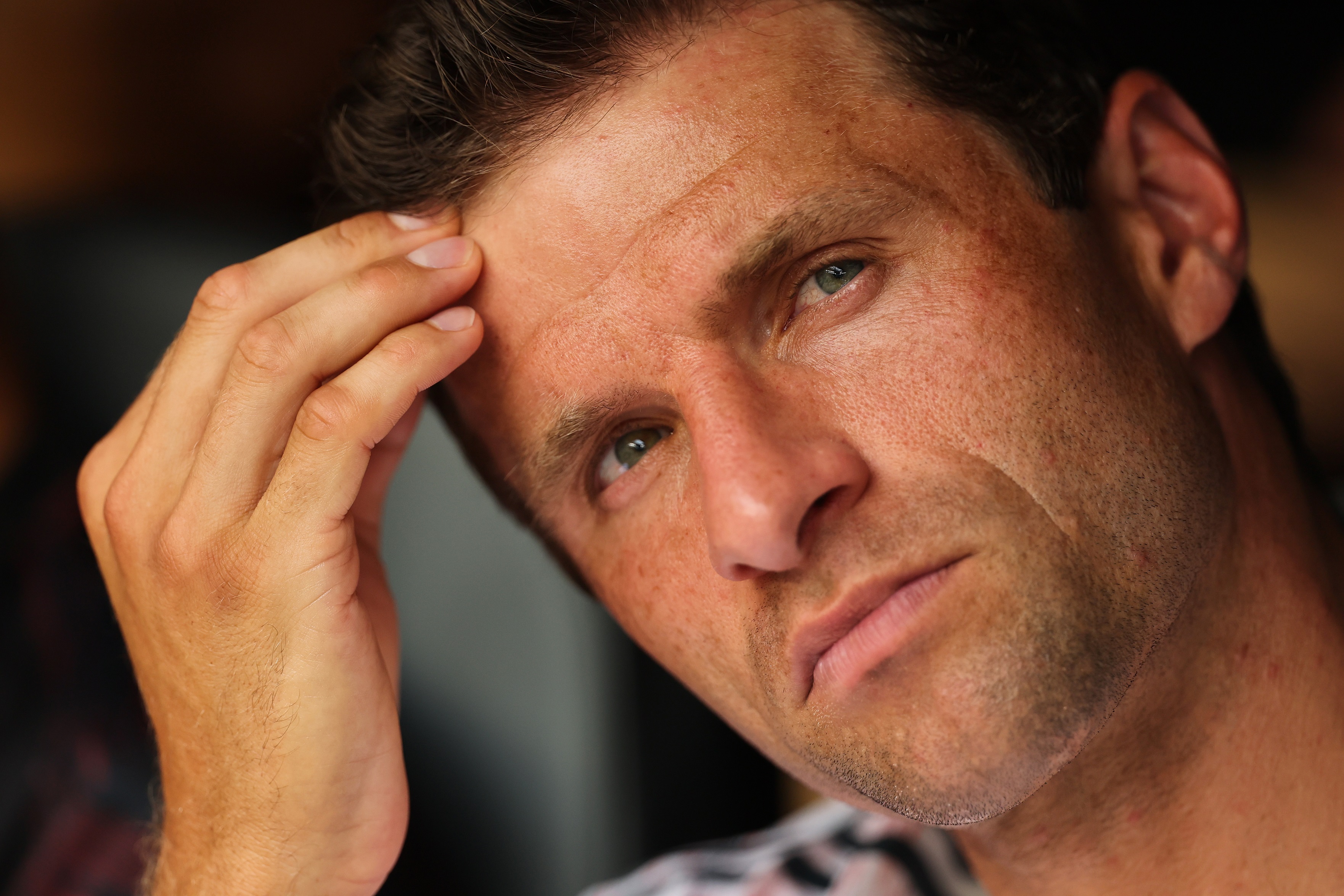 Thomas Muller scratches his forehead.