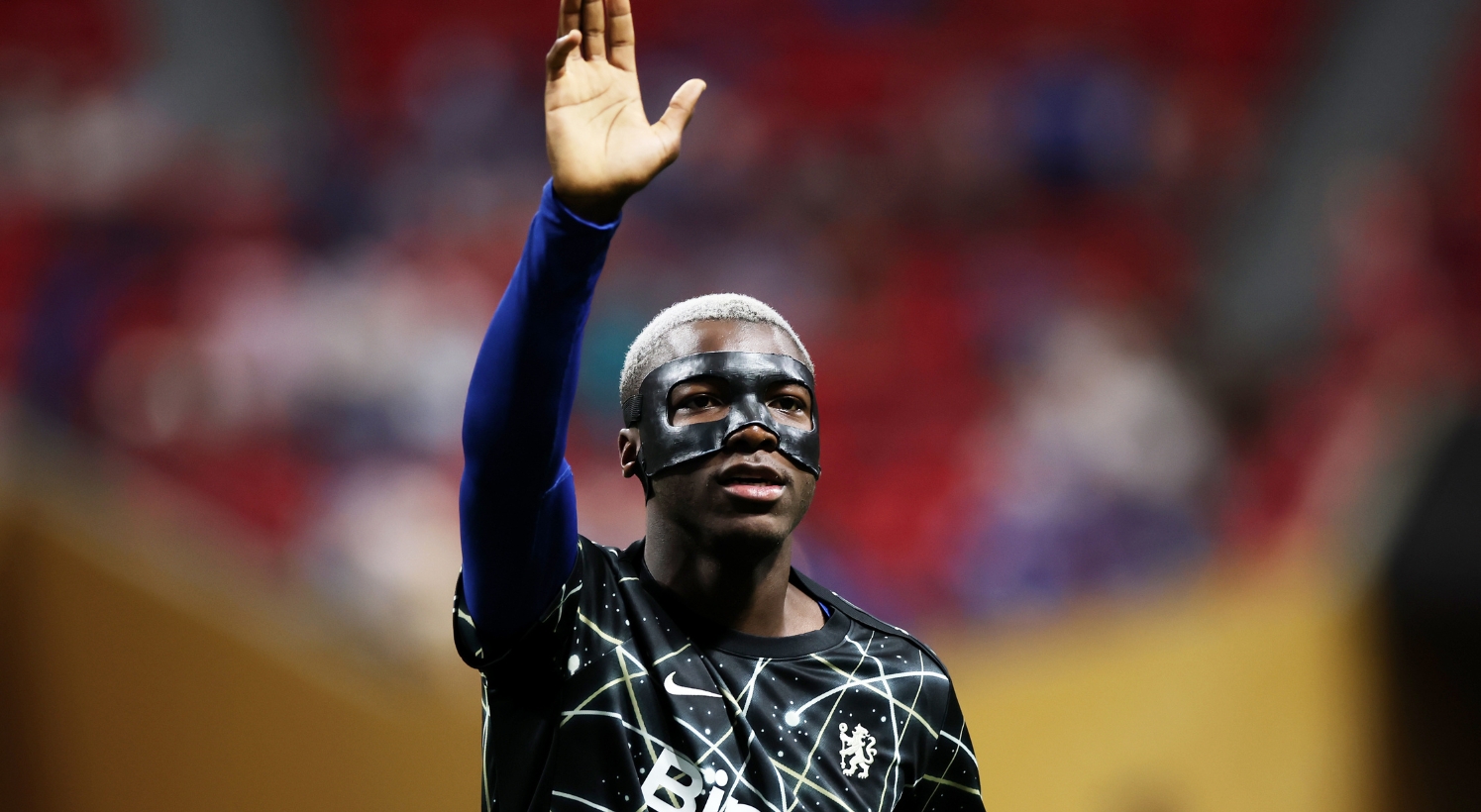 Nicolas Jackson acknowledges the crowd