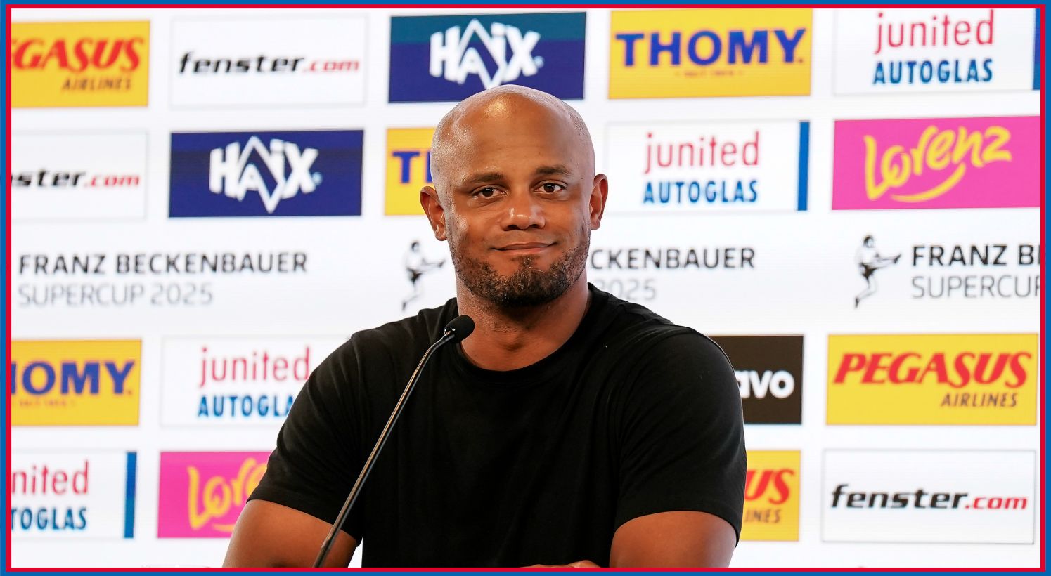 Vincent Kompany speaking to reporters