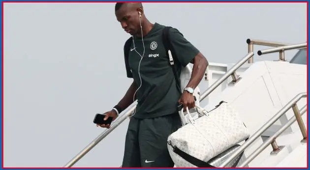 Nicolas Jackson disembarks a flight