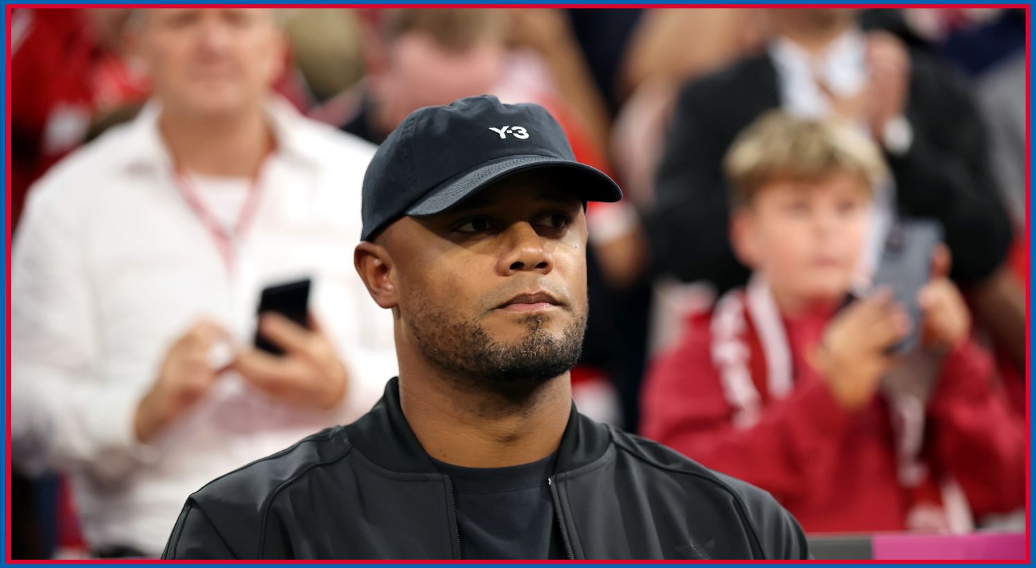 Vincent Kompany watches on during Bayern Munich v RB Leipzig
