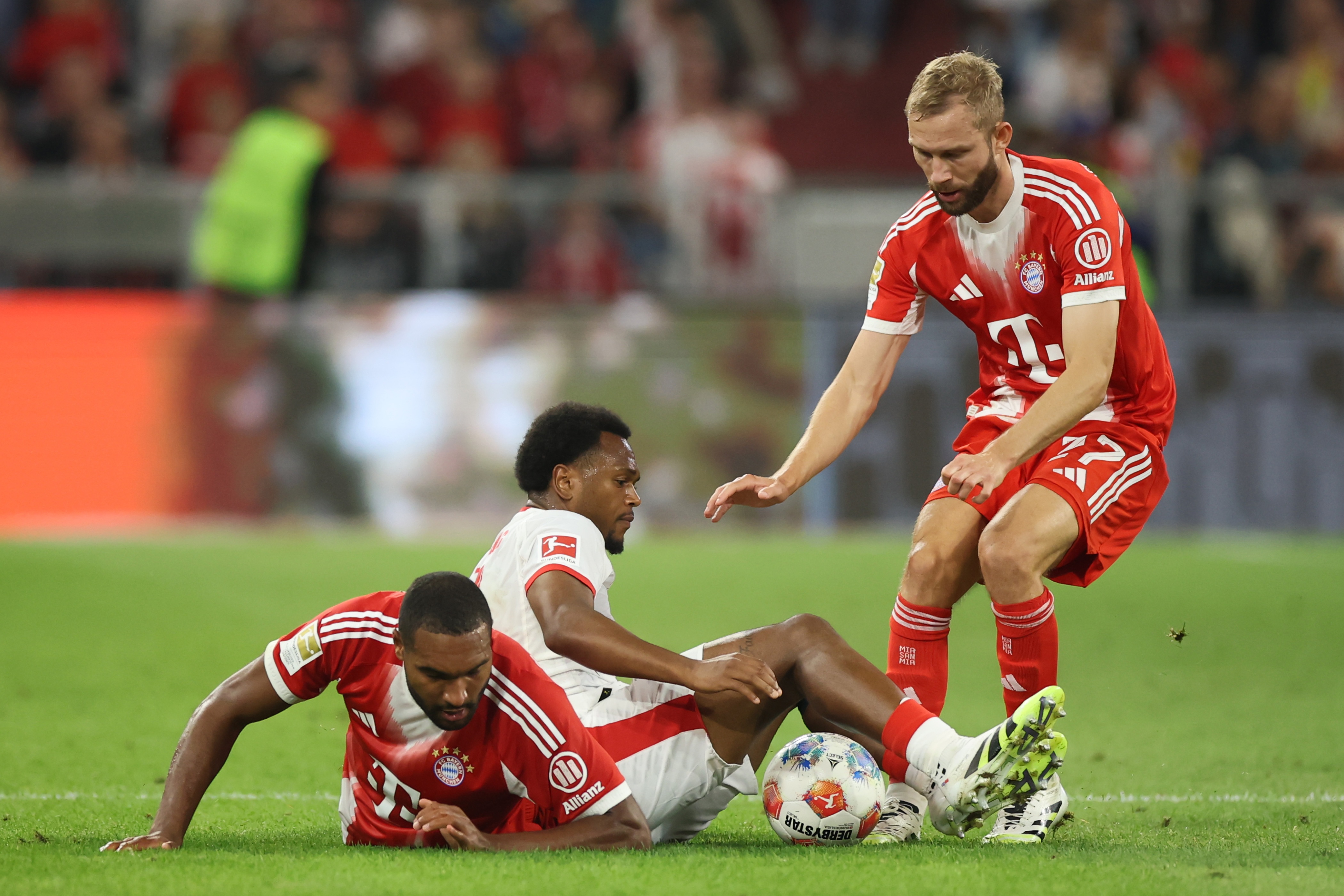 Lois Openda falls to the ground.