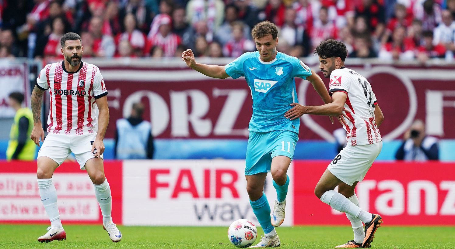 Fisnik Asllani with the ball in his feet