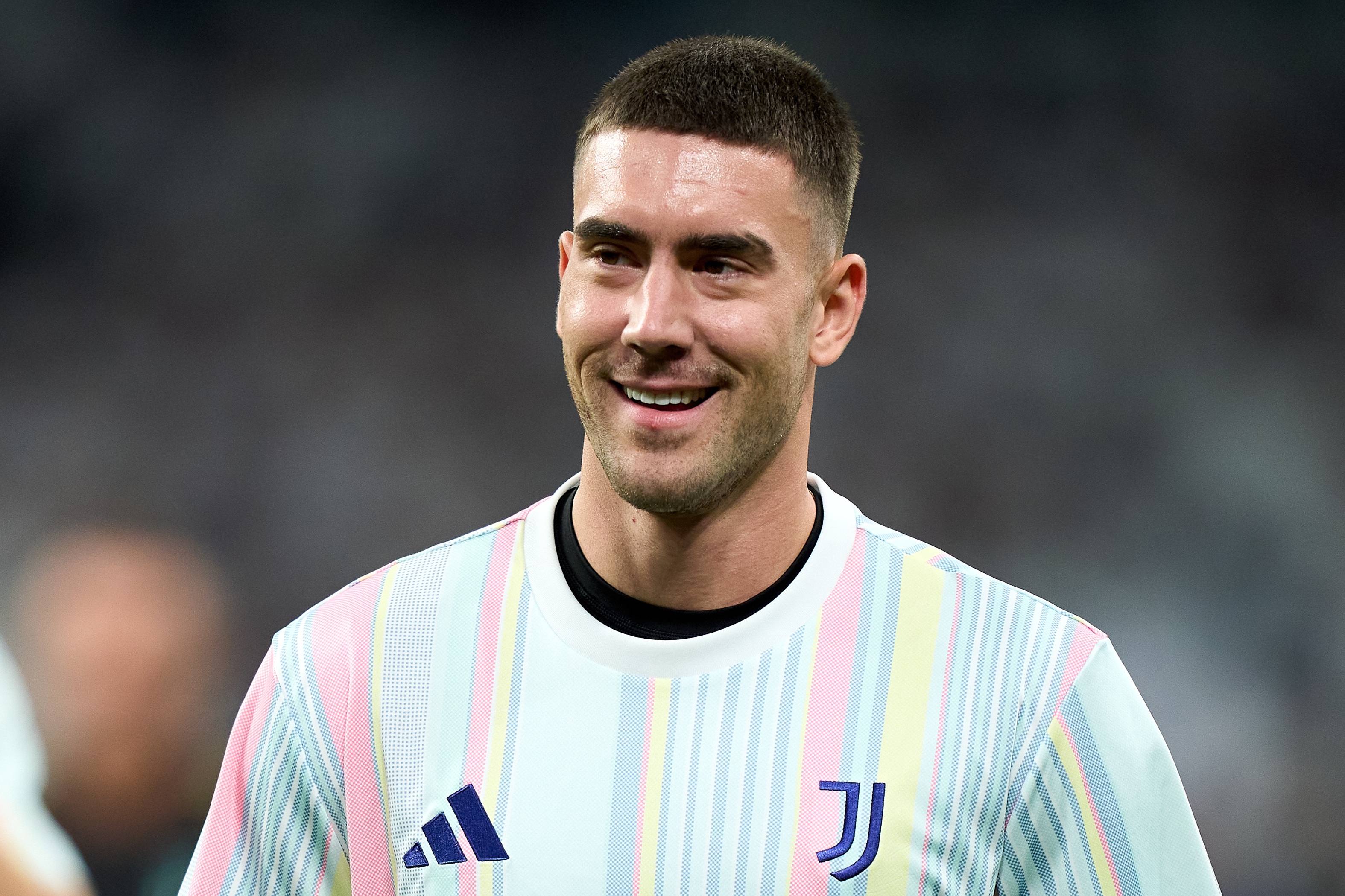 Dusan Vlahovic smiles during Juventus game.