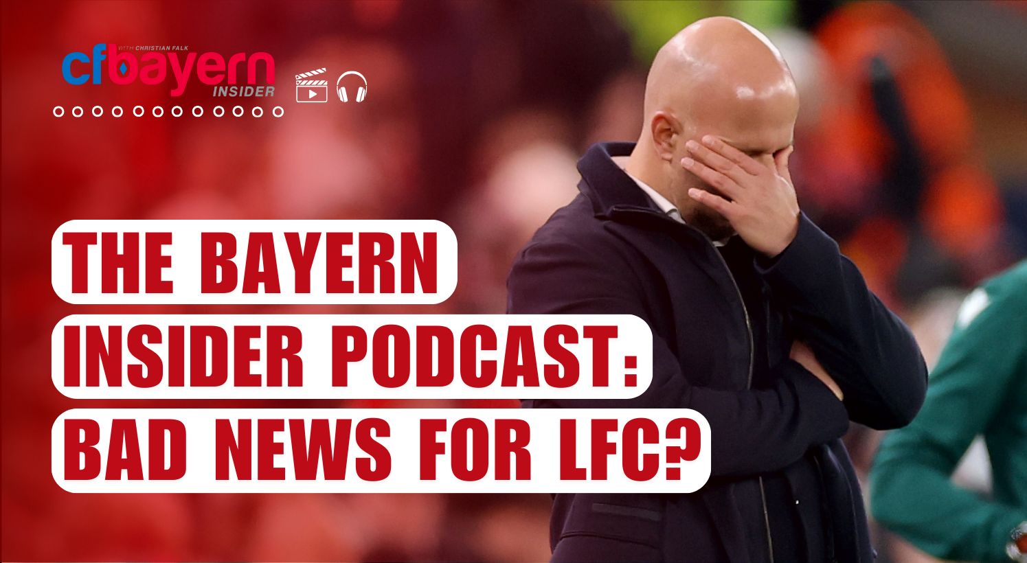 Liverpool head coach Arne Slot buries his head in one hand in anguish.