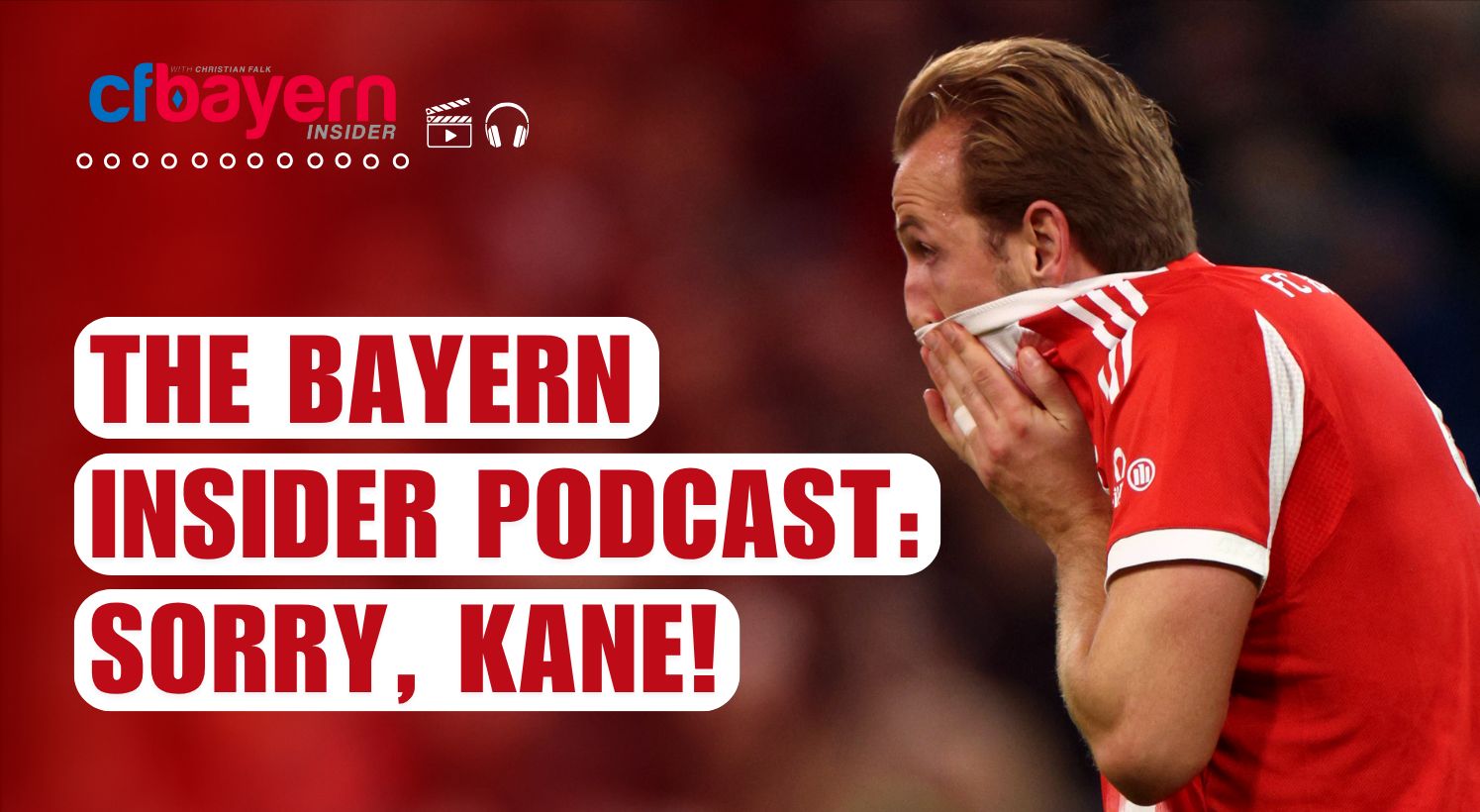 Harry Kane covers his mouth with his shirt in shock.