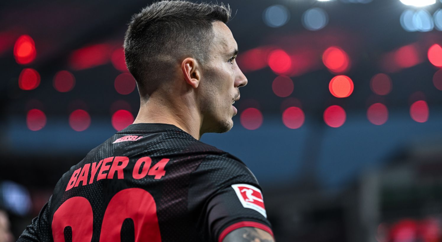 Alejandro Grimaldo looks on for Bayer Leverkusen