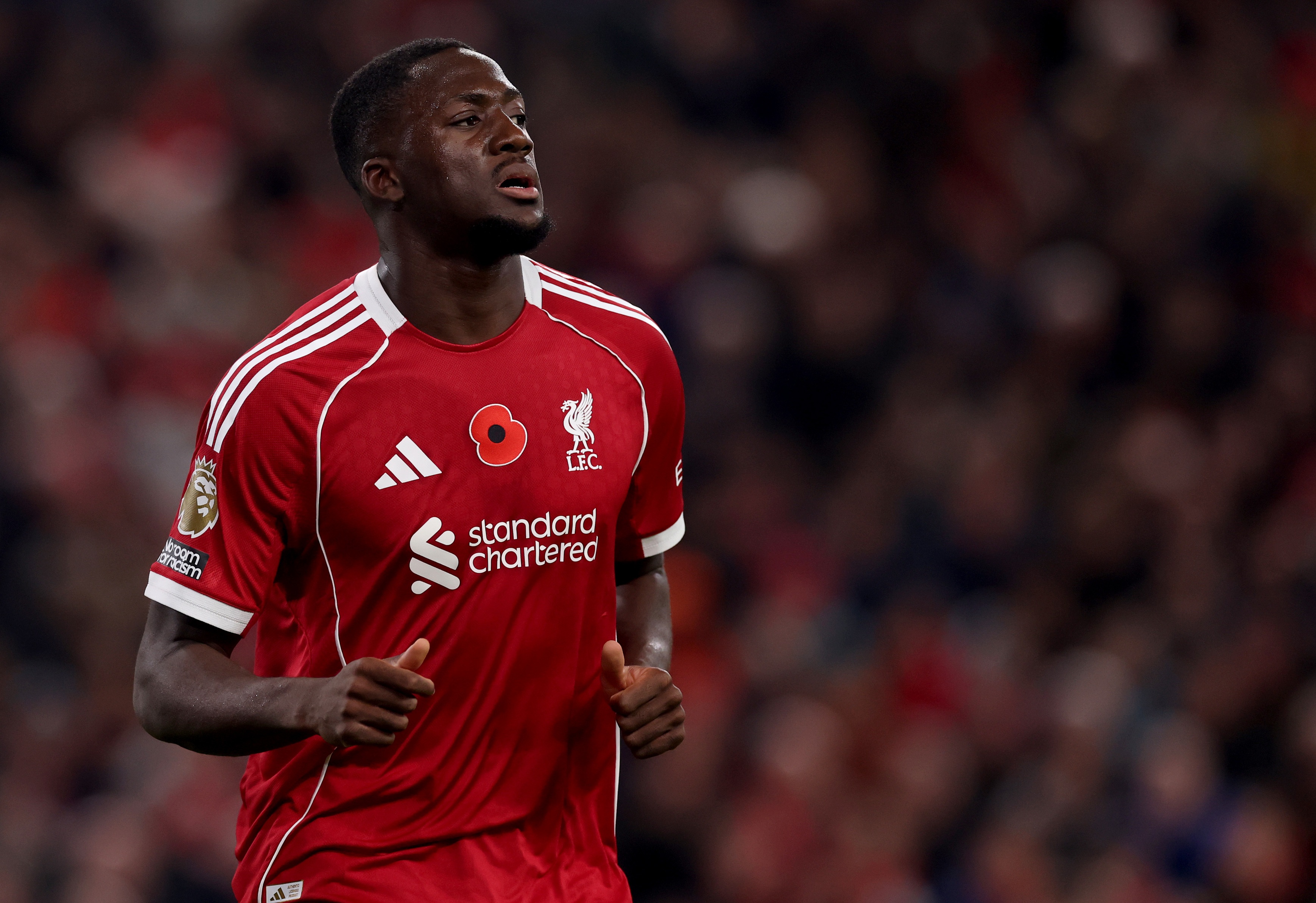 Ibrahima Konate runs on the pitch during Liverpool game.