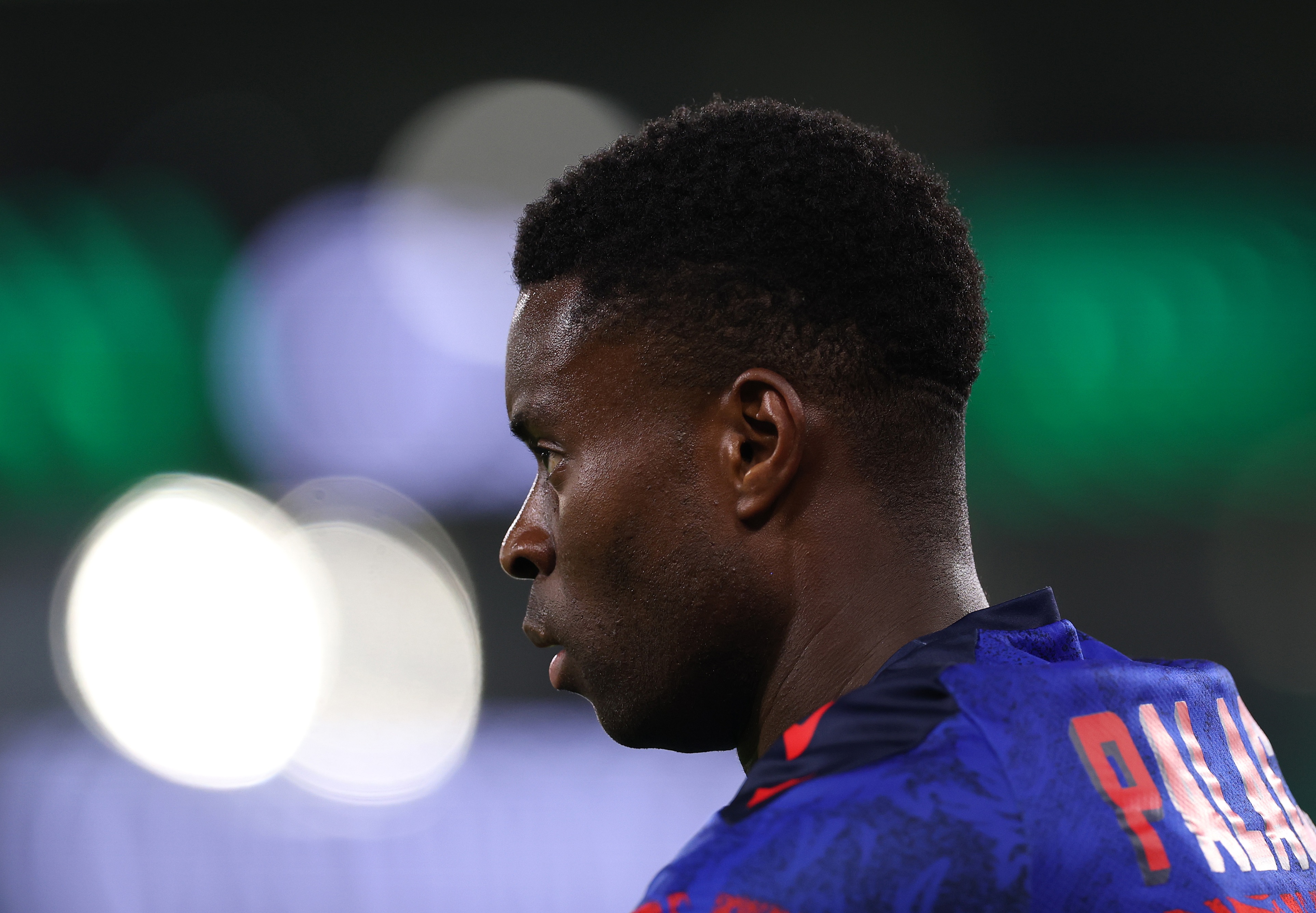 Marc Guehi looks on during Crystal Palace game.