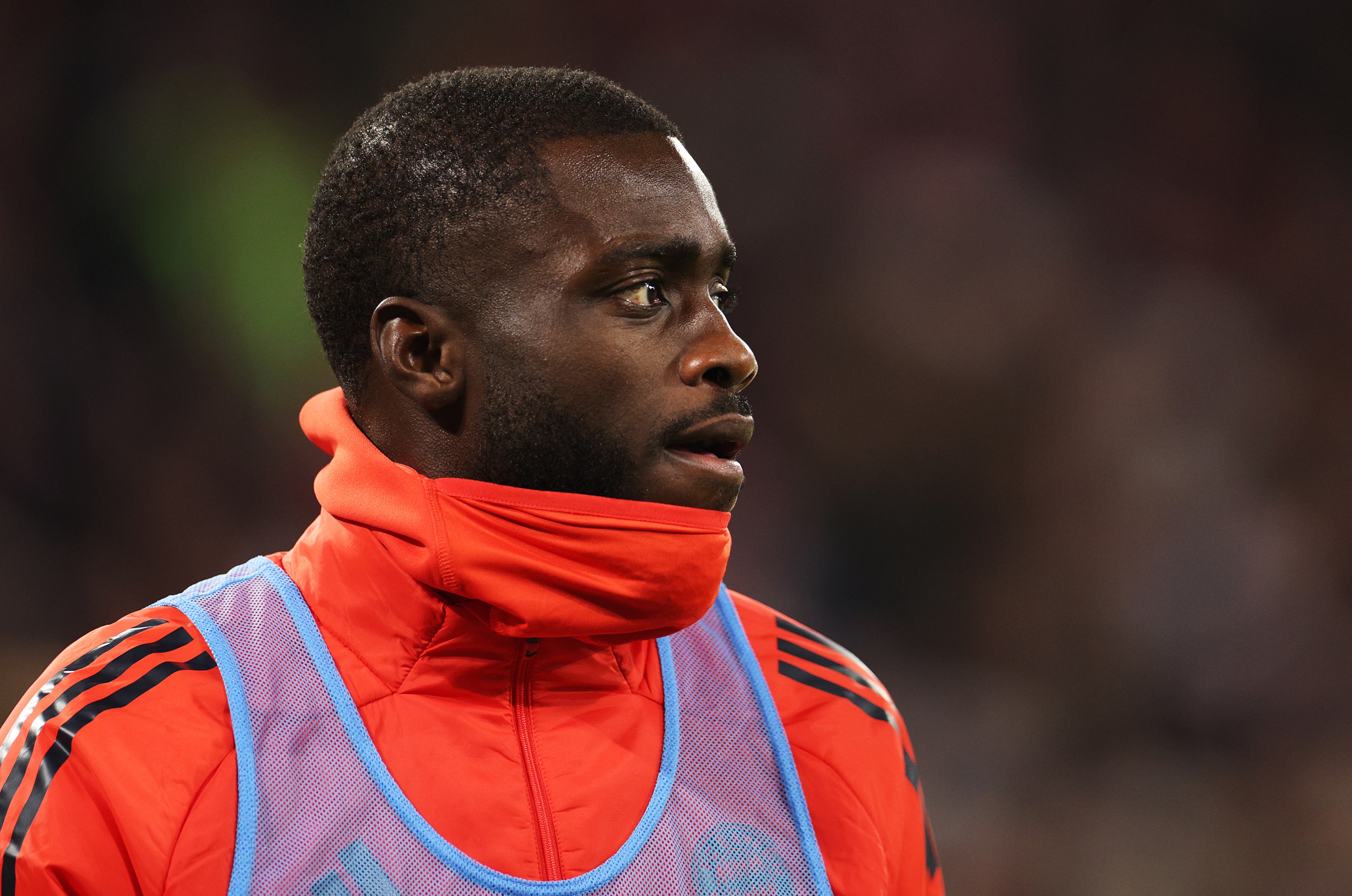 Dayot Upamecano looks on.