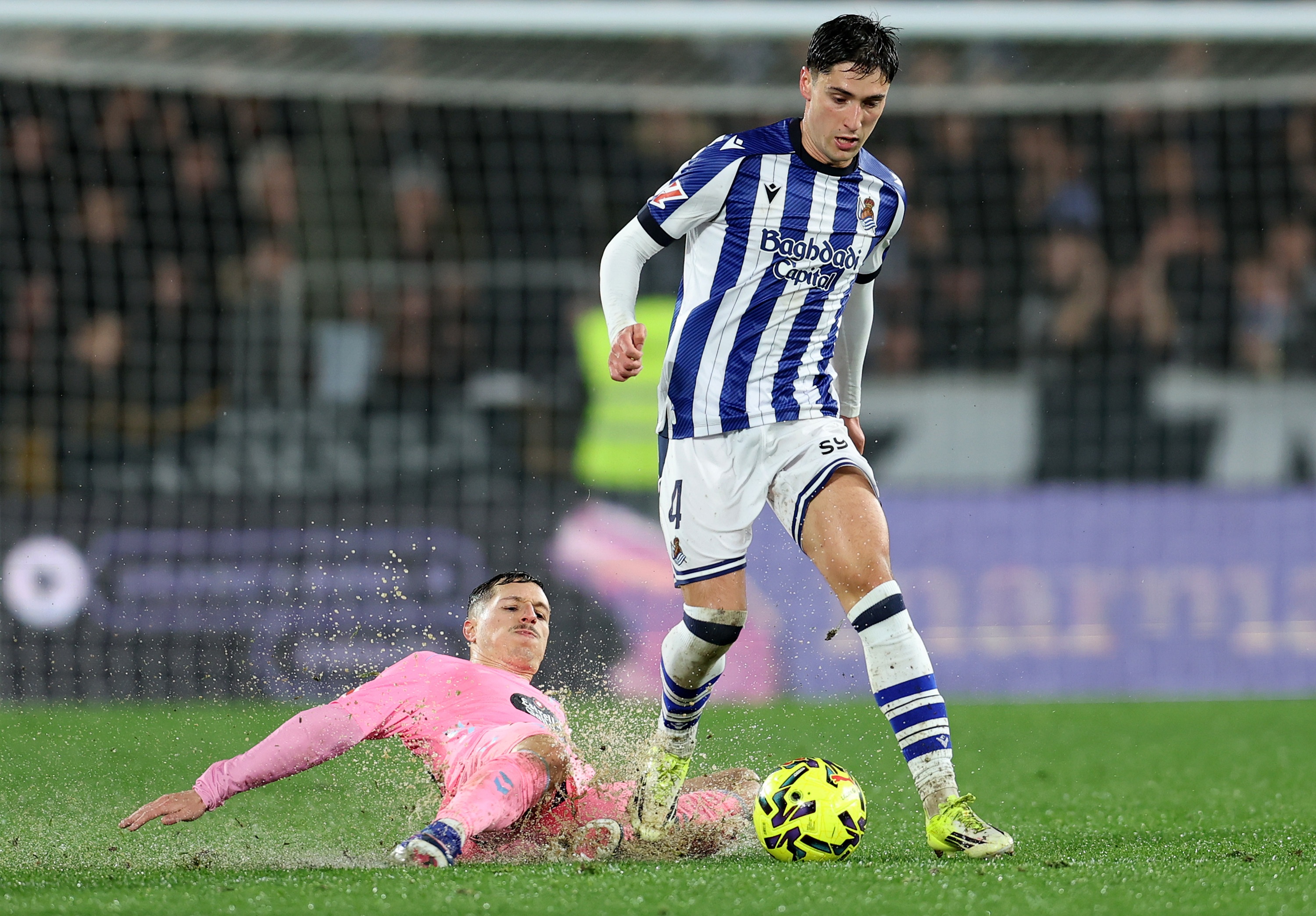 Bryan Zaragoza goes to ground to slide tackle Jon Gorrotxategi.