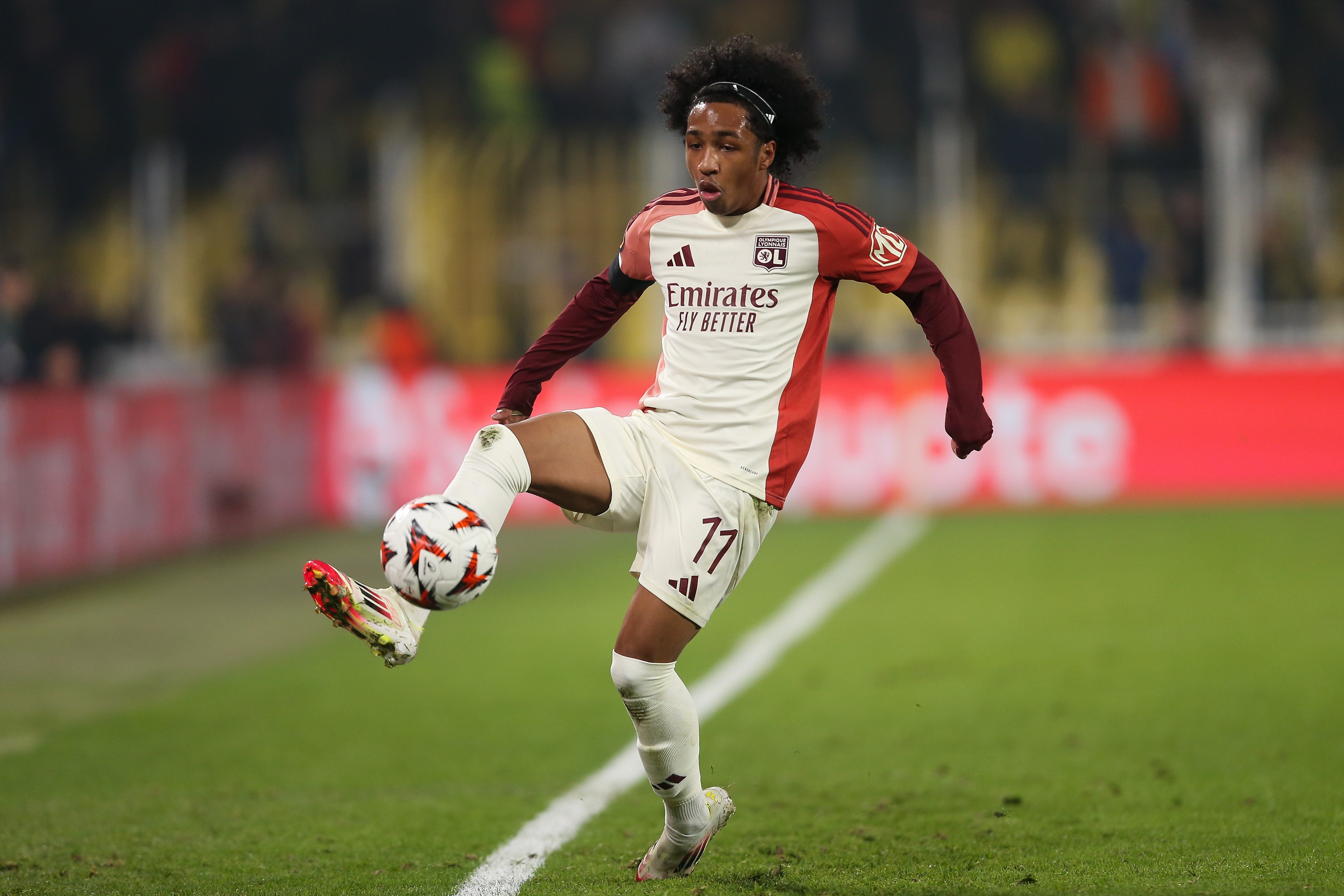 Malick Fofana controls the ball during Lyon game.