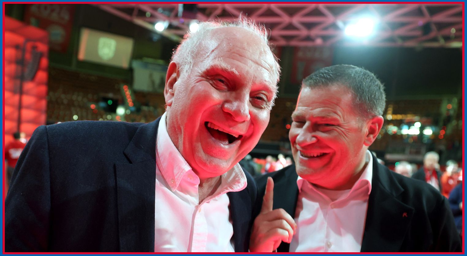 Bayern chief Uli Hoeness laughs alongside director of sport Max Eberl.