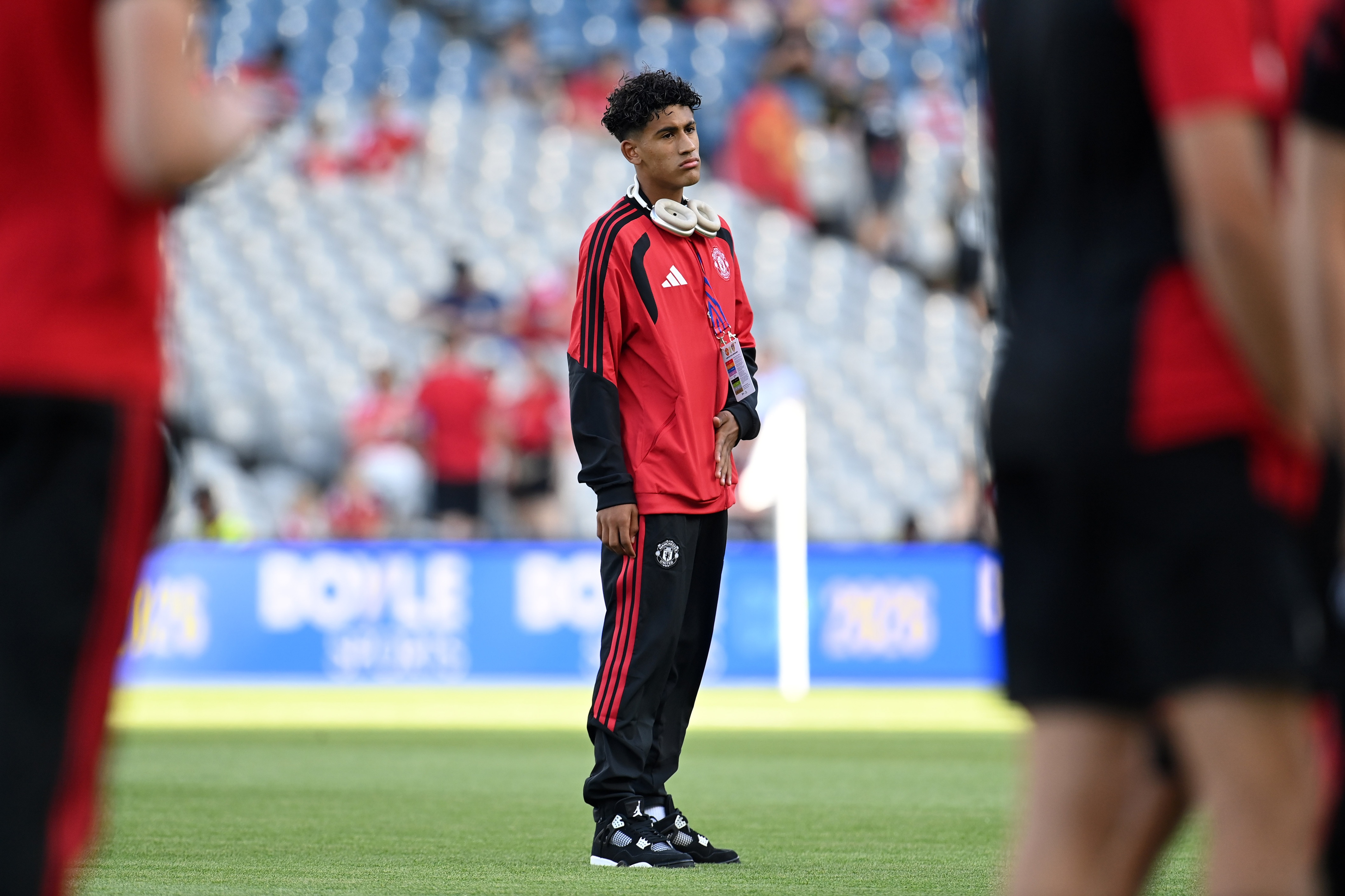 Manchester United prodigy JJ Gabriel stands on the pitch.
