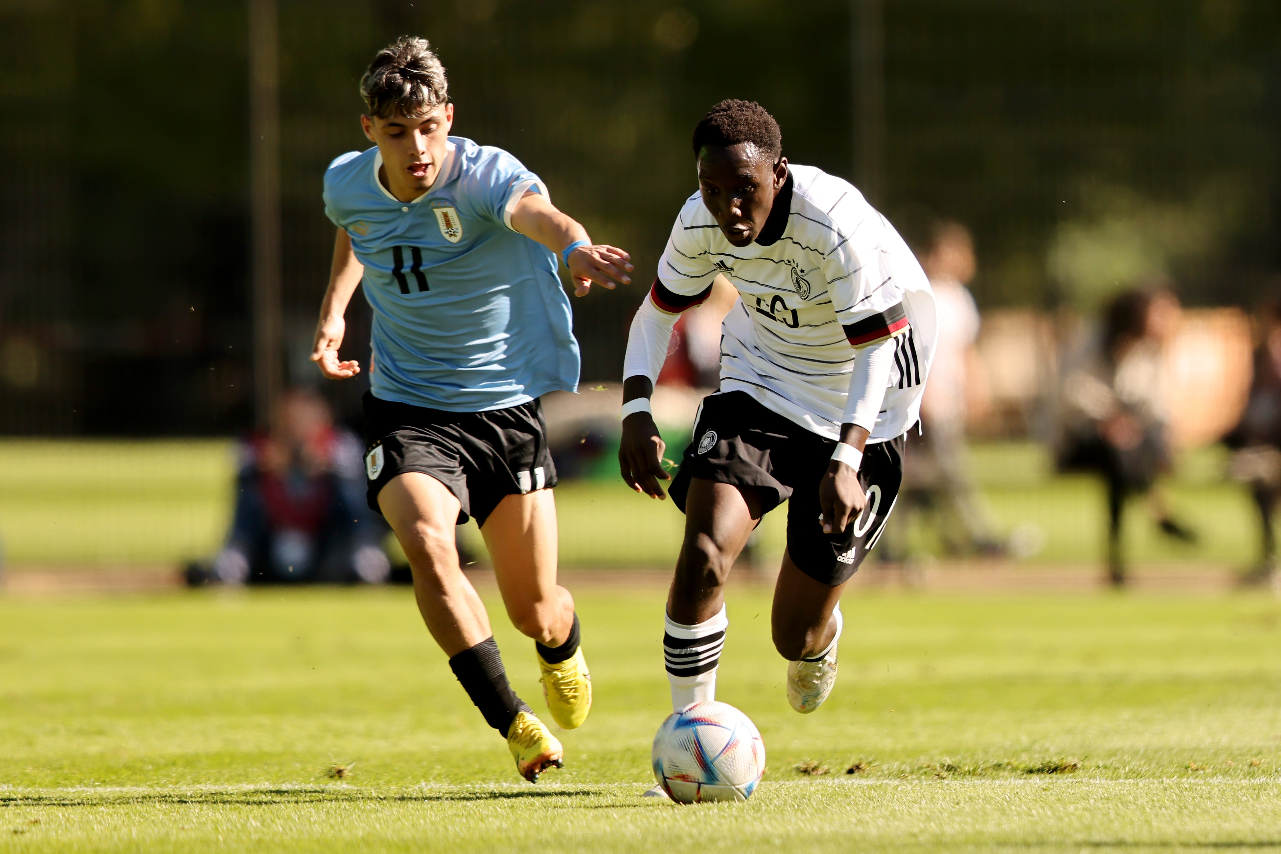 Rodrigo Dudok of Uruguay challenges Jean-Paul Ndiaye of Germany